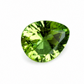 A single faceted pear-cut green gemstone, likely a peridot, centered on a plain white background.